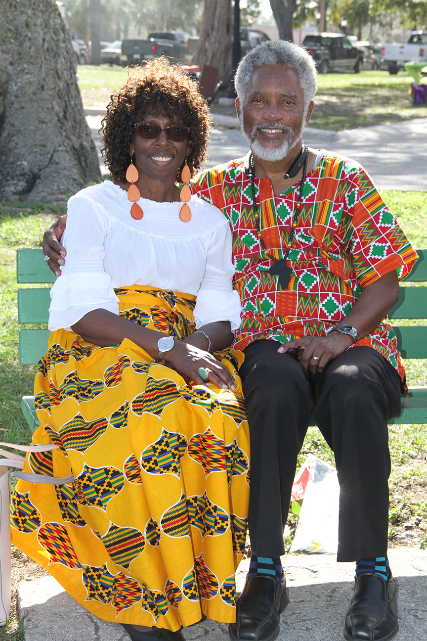 Couple with traditional patterned fabric